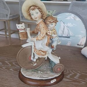 Charming Figurine of Children on Tricycle